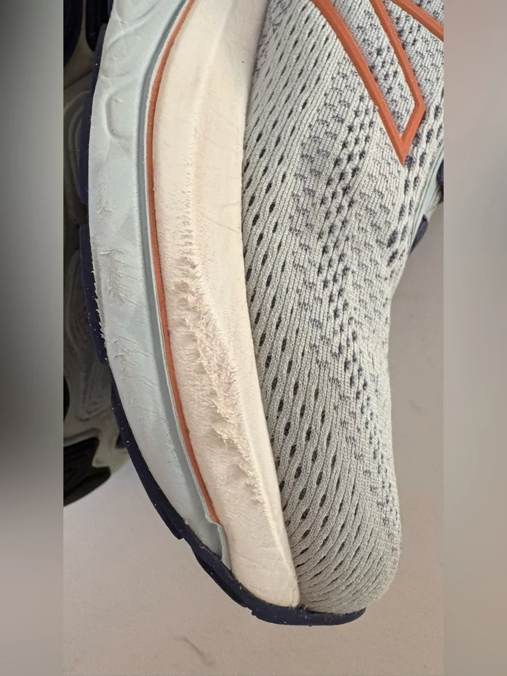 New Balance Women’s Running Sneakers - Light Blue, Navy & Coral Accents.
